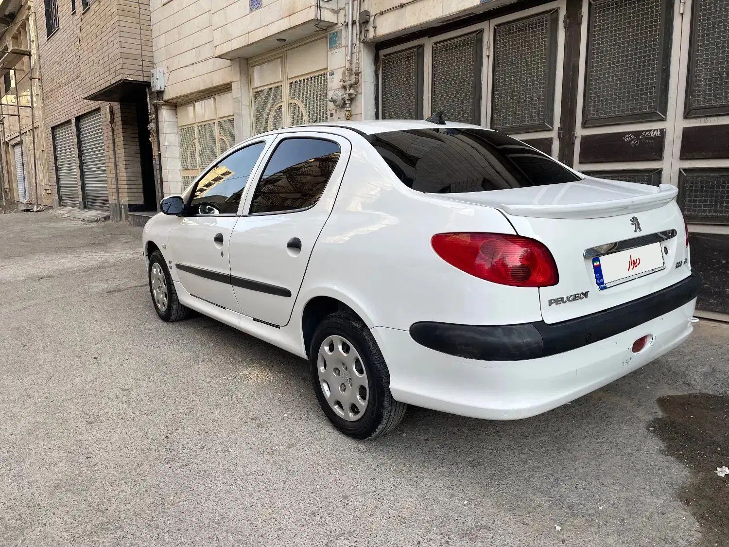 پژو ۲۰۶ صندوق دار v8 - 1395