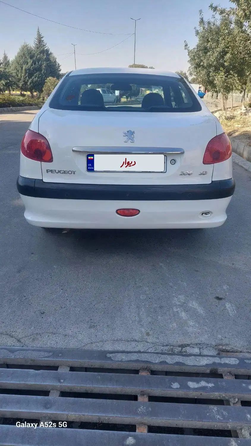 پژو ۲۰۶ صندوق دار v8 - 1397