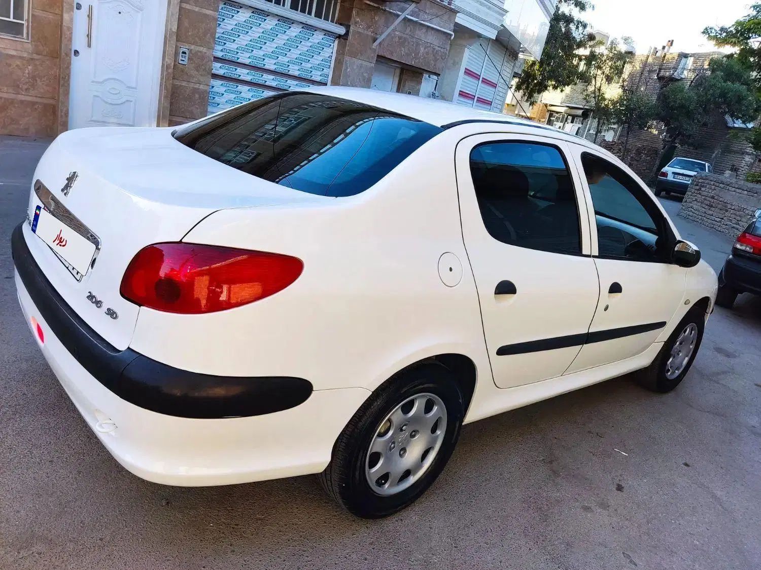 پژو ۲۰۶ صندوق دار v8 - 1392