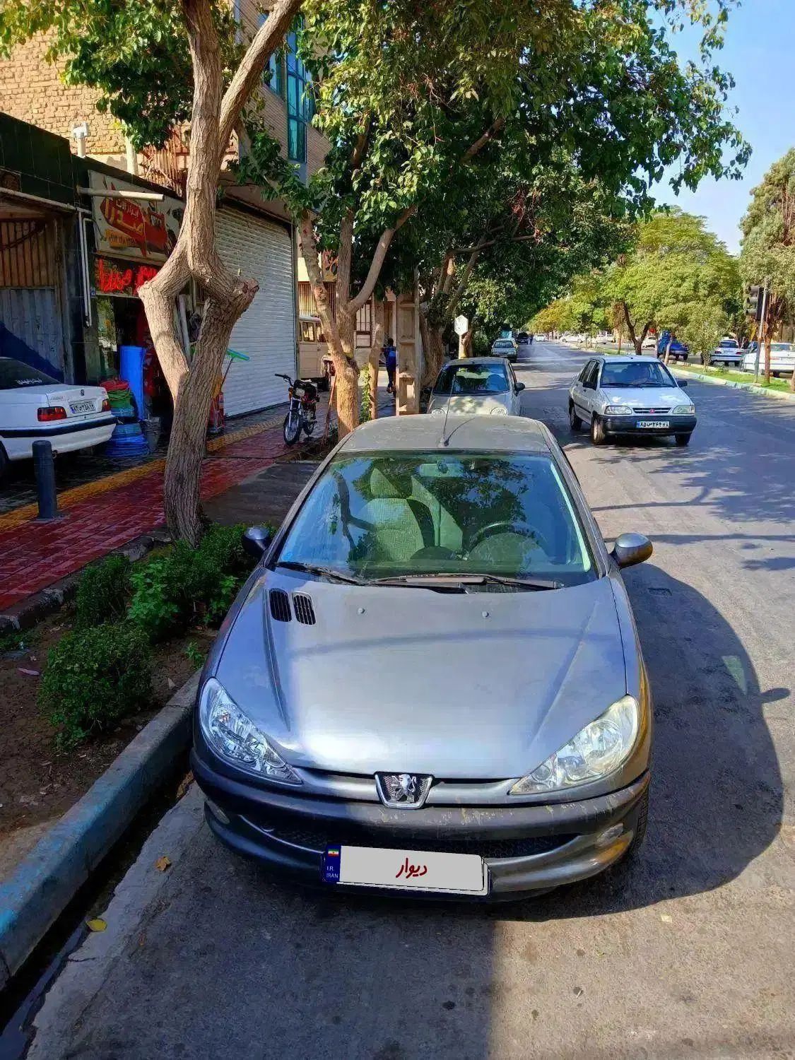 پژو ۲۰۶ صندوق دار v8 - 1395