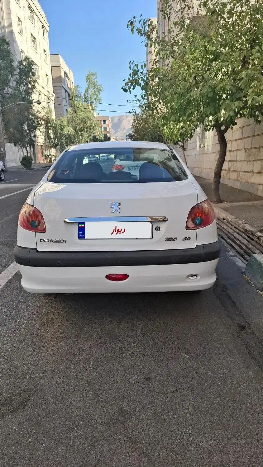پژو ۲۰۶ صندوق دار v8 - 1397