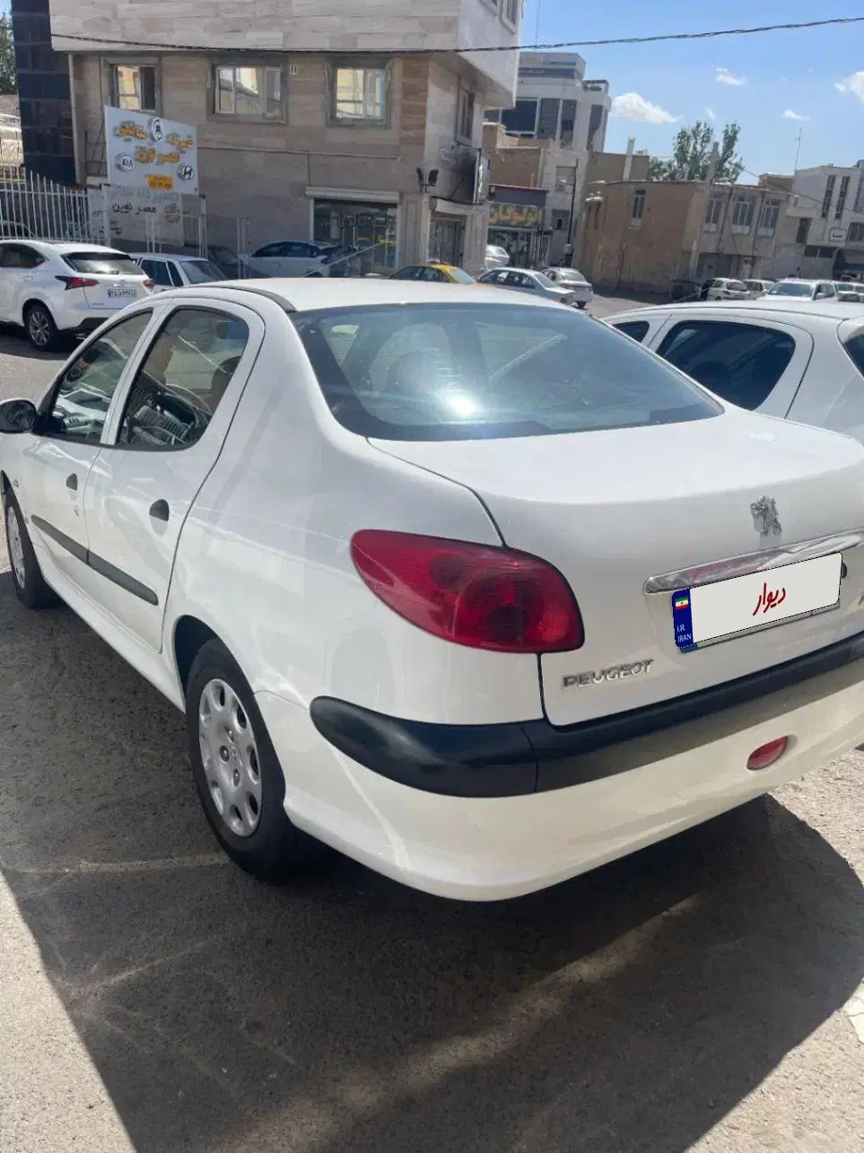 پژو ۲۰۶ صندوق دار v8 - 1398