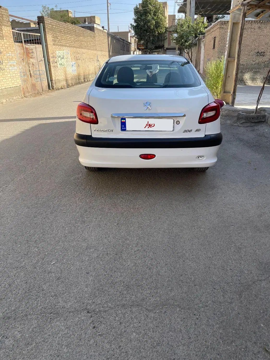 پژو ۲۰۶ صندوق دار v8 - 1397