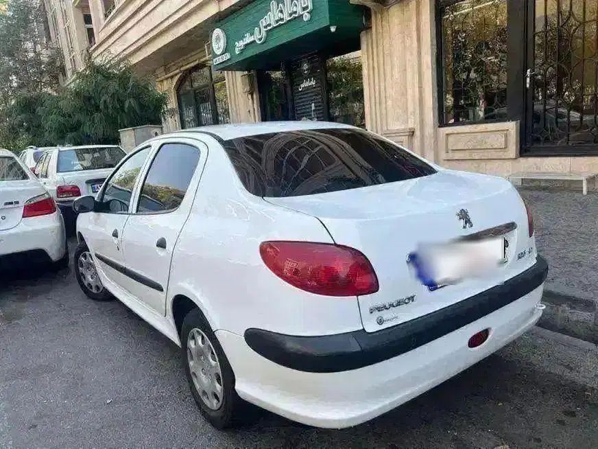پژو ۲۰۶ صندوق دار v8 - 1397
