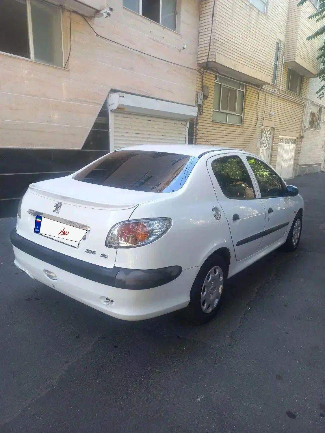پژو ۲۰۶ صندوق دار v8 - 1394