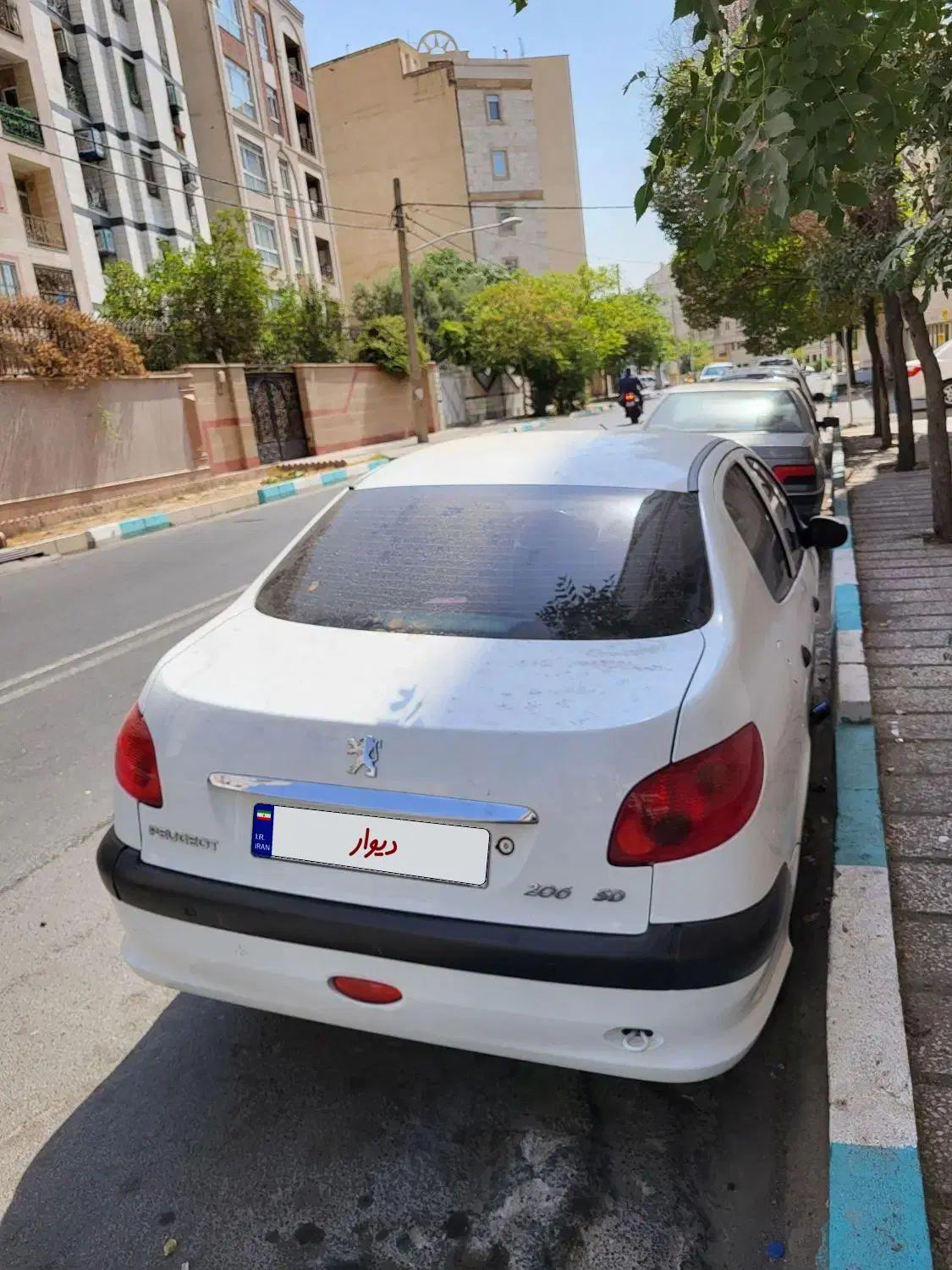 پژو ۲۰۶ صندوق دار v8 - 1396