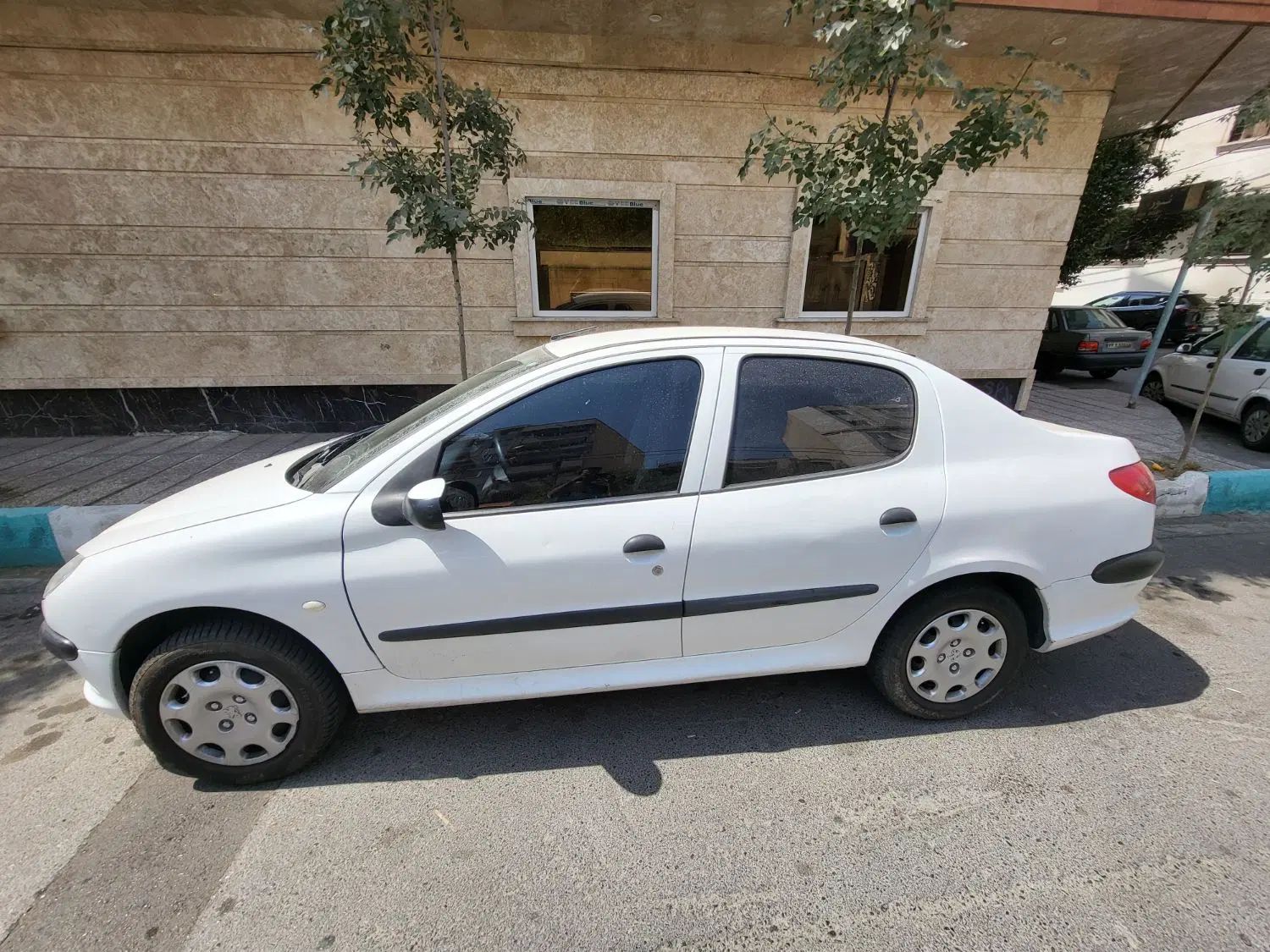 پژو ۲۰۶ صندوق دار v8 - 1396