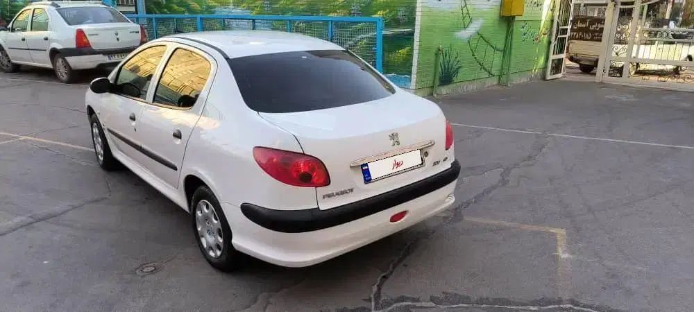 پژو ۲۰۶ صندوق دار v8 - 1395