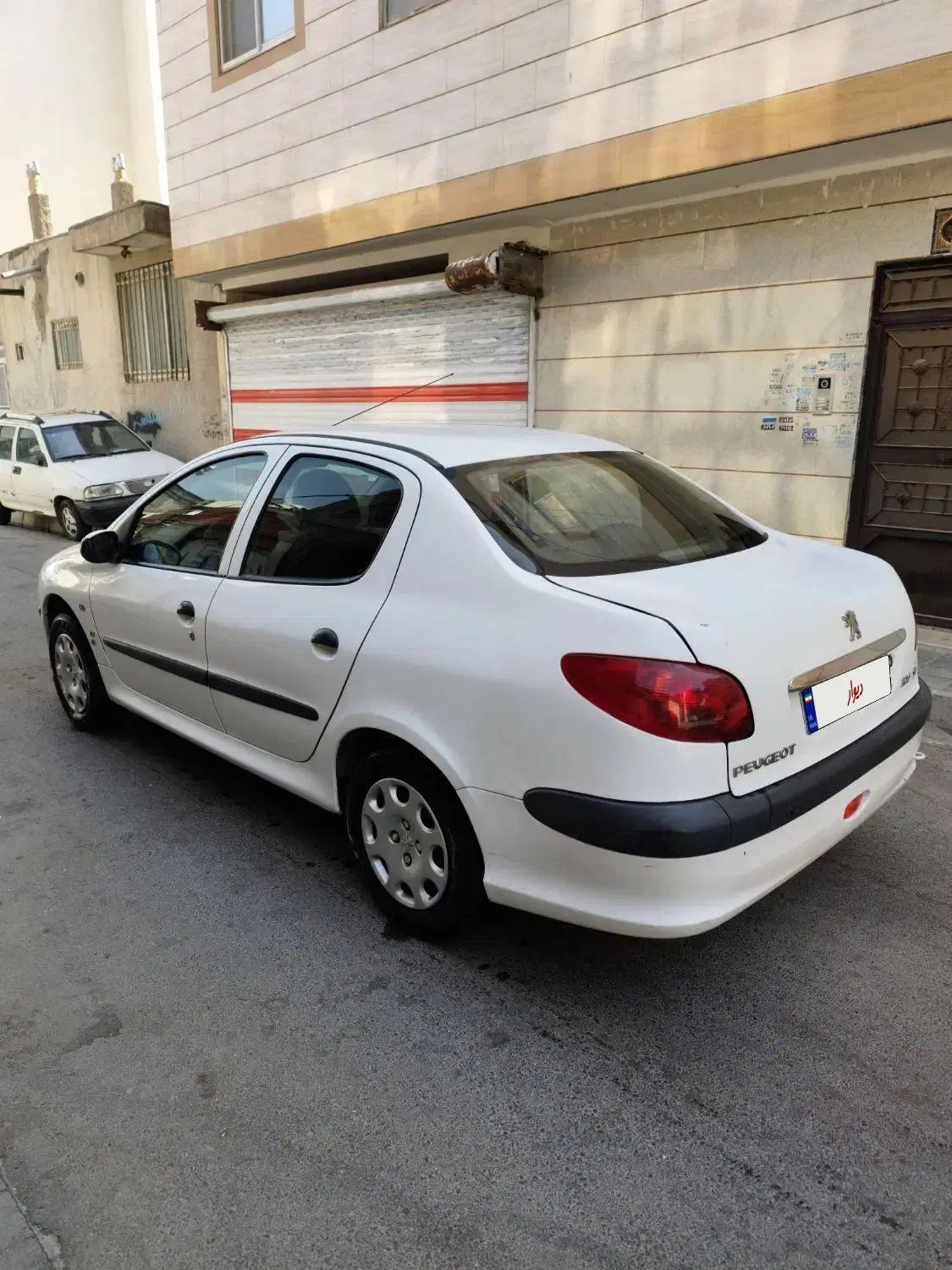 پژو ۲۰۶ صندوق دار v8 - 1393