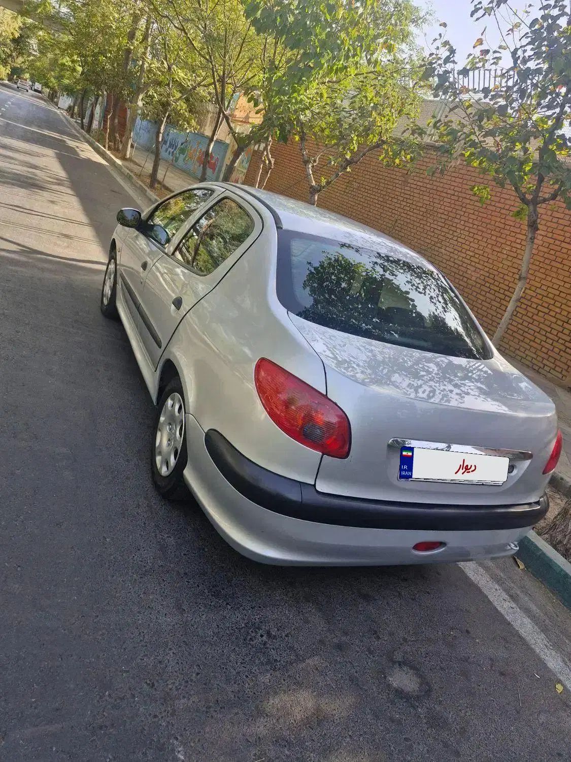 پژو ۲۰۶ صندوق دار v8 - 1394