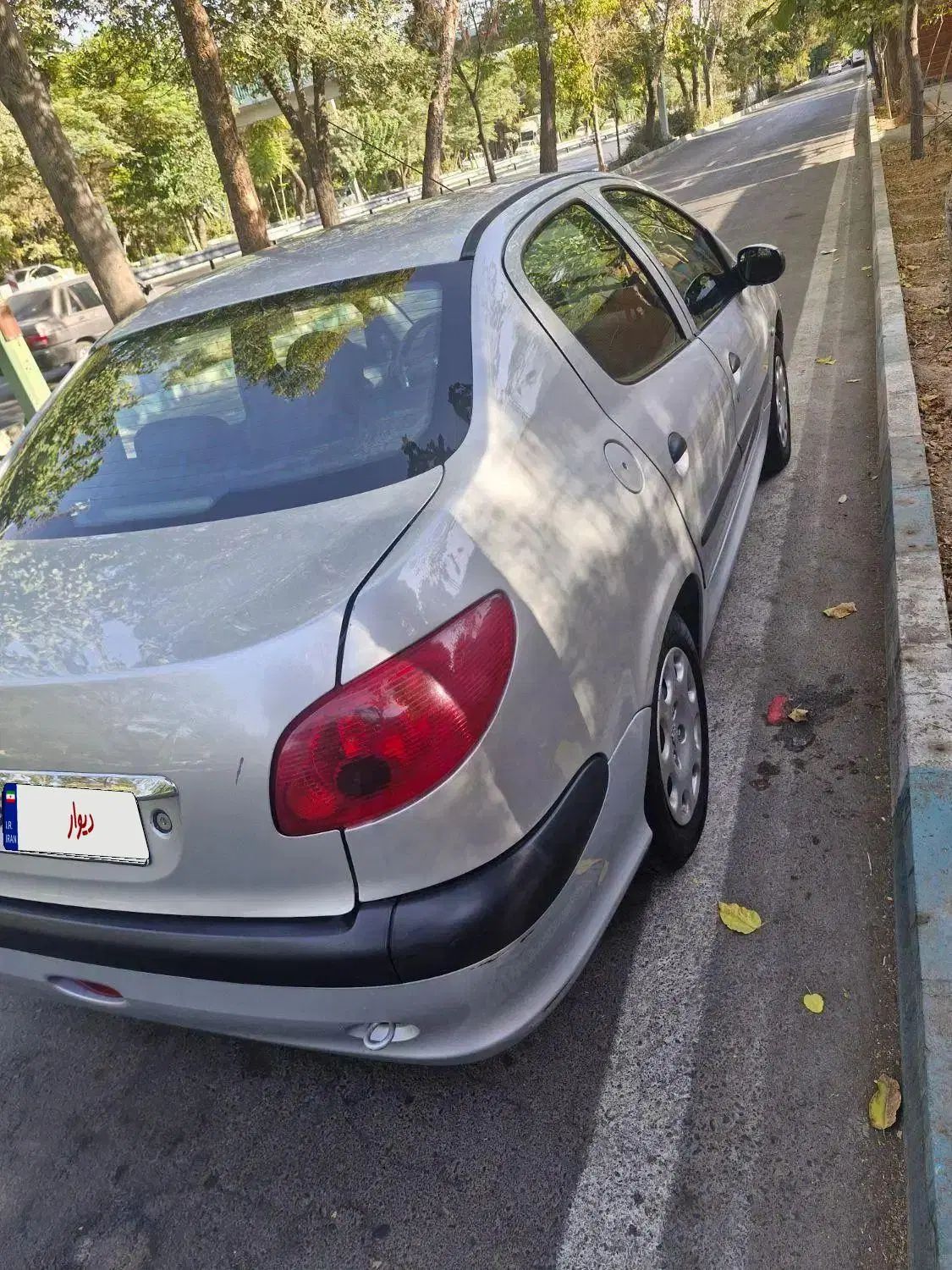 پژو ۲۰۶ صندوق دار v8 - 1394