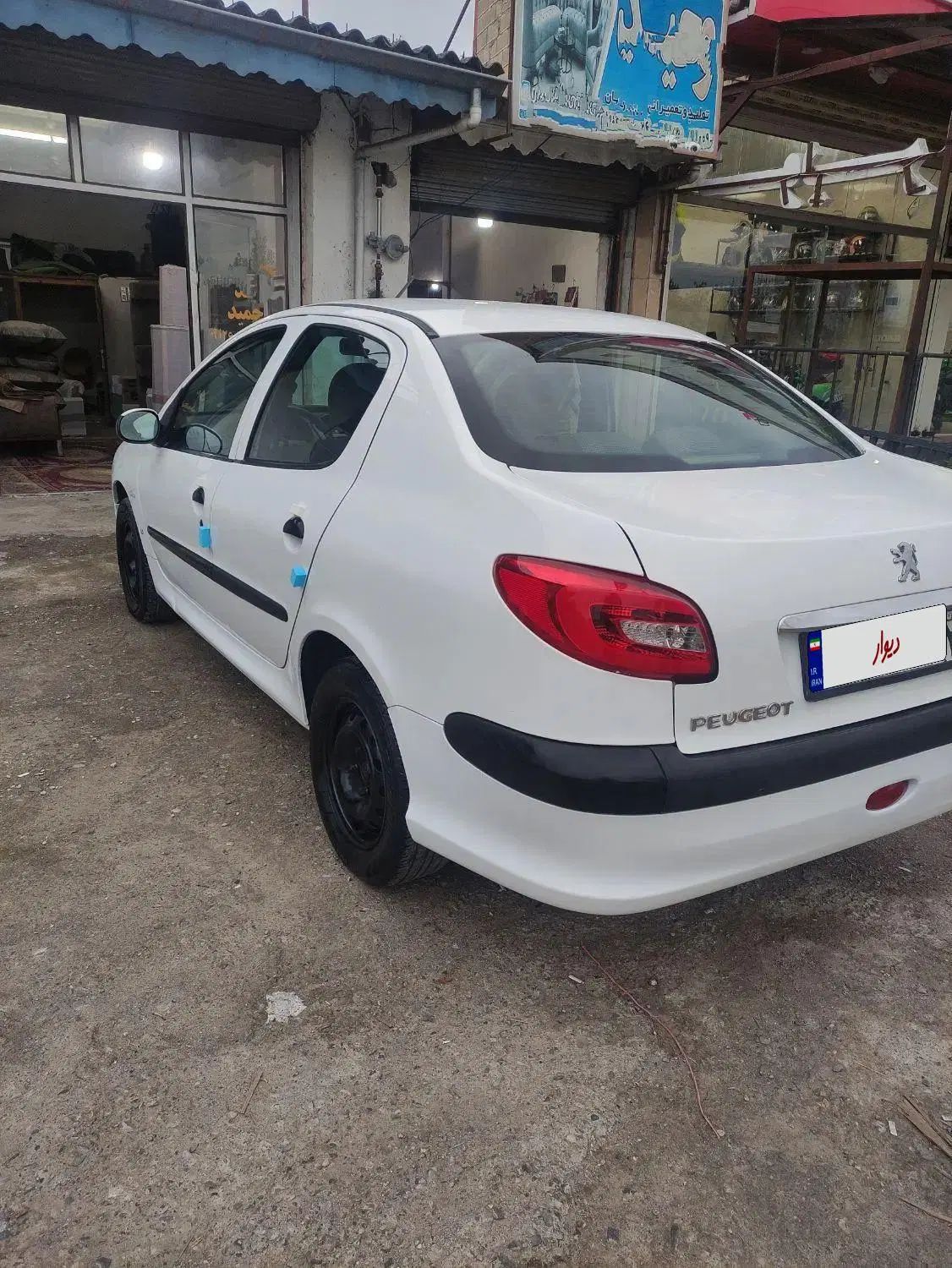 پژو ۲۰۶ صندوق دار v8 - 1394
