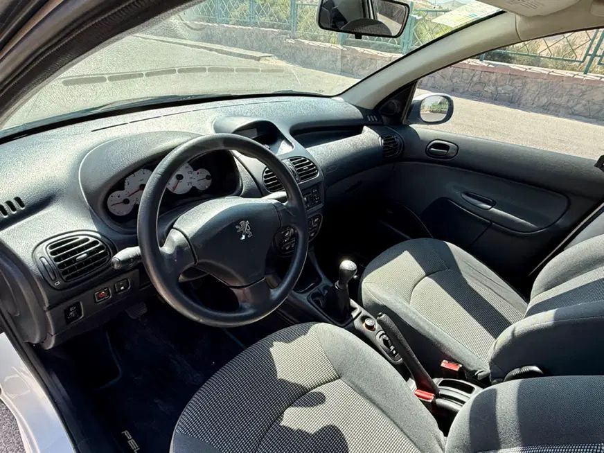 پژو ۲۰۶ صندوق دار v8 - 1398