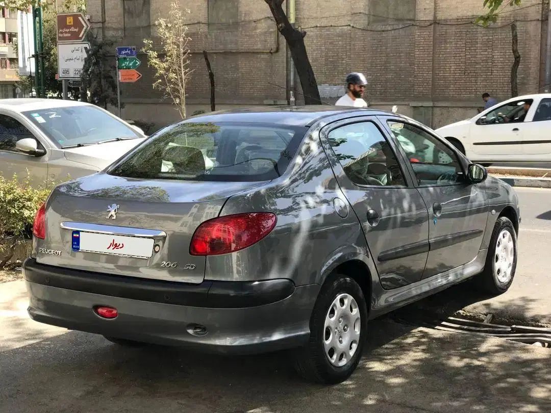 پژو ۲۰۶ صندوق دار v8 - 1397