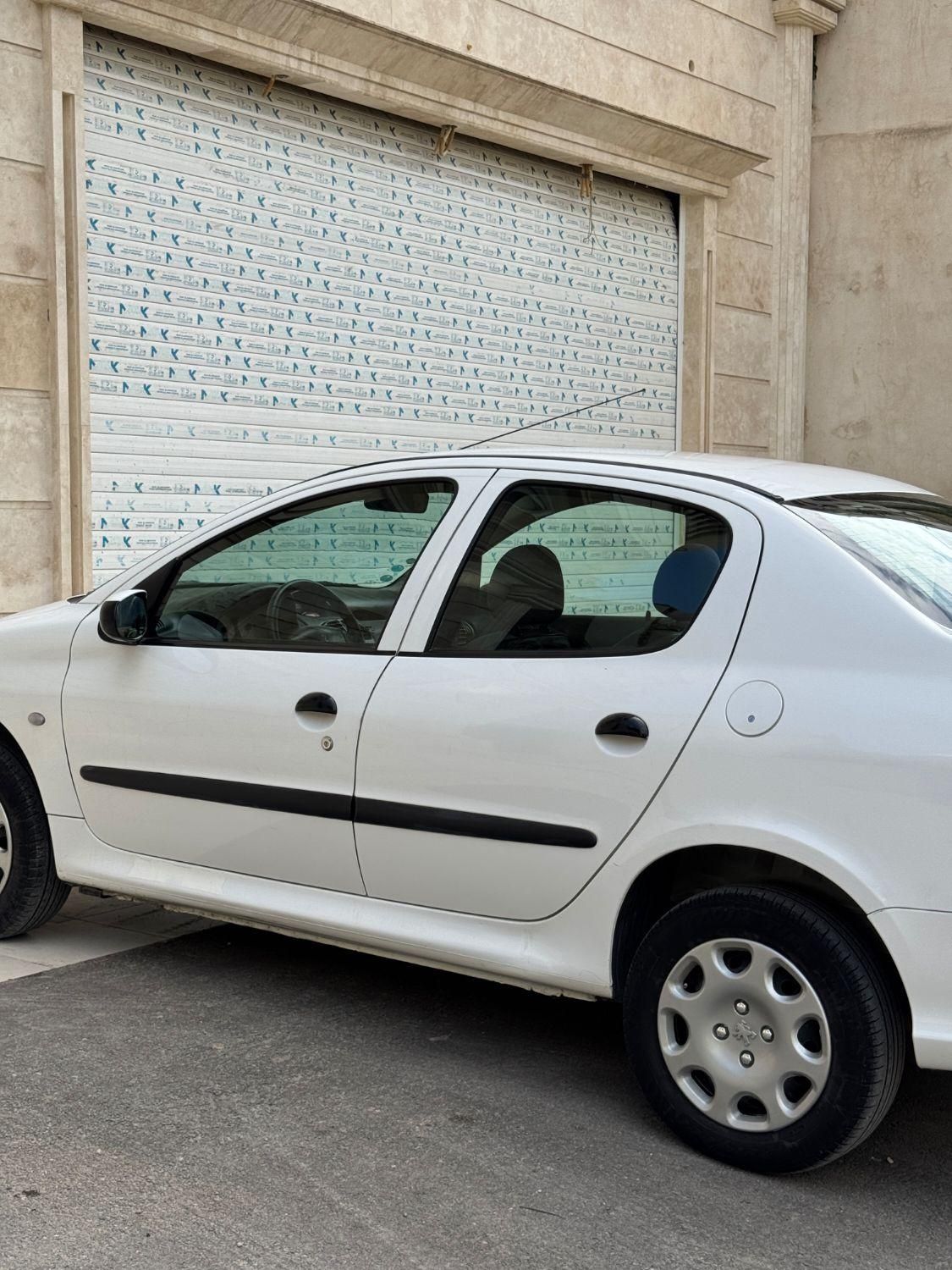 پژو ۲۰۶ صندوق دار v8 - 1391