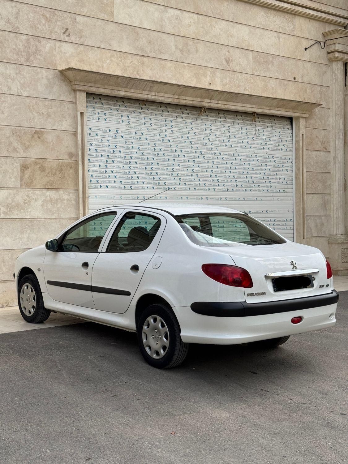 پژو ۲۰۶ صندوق دار v8 - 1391