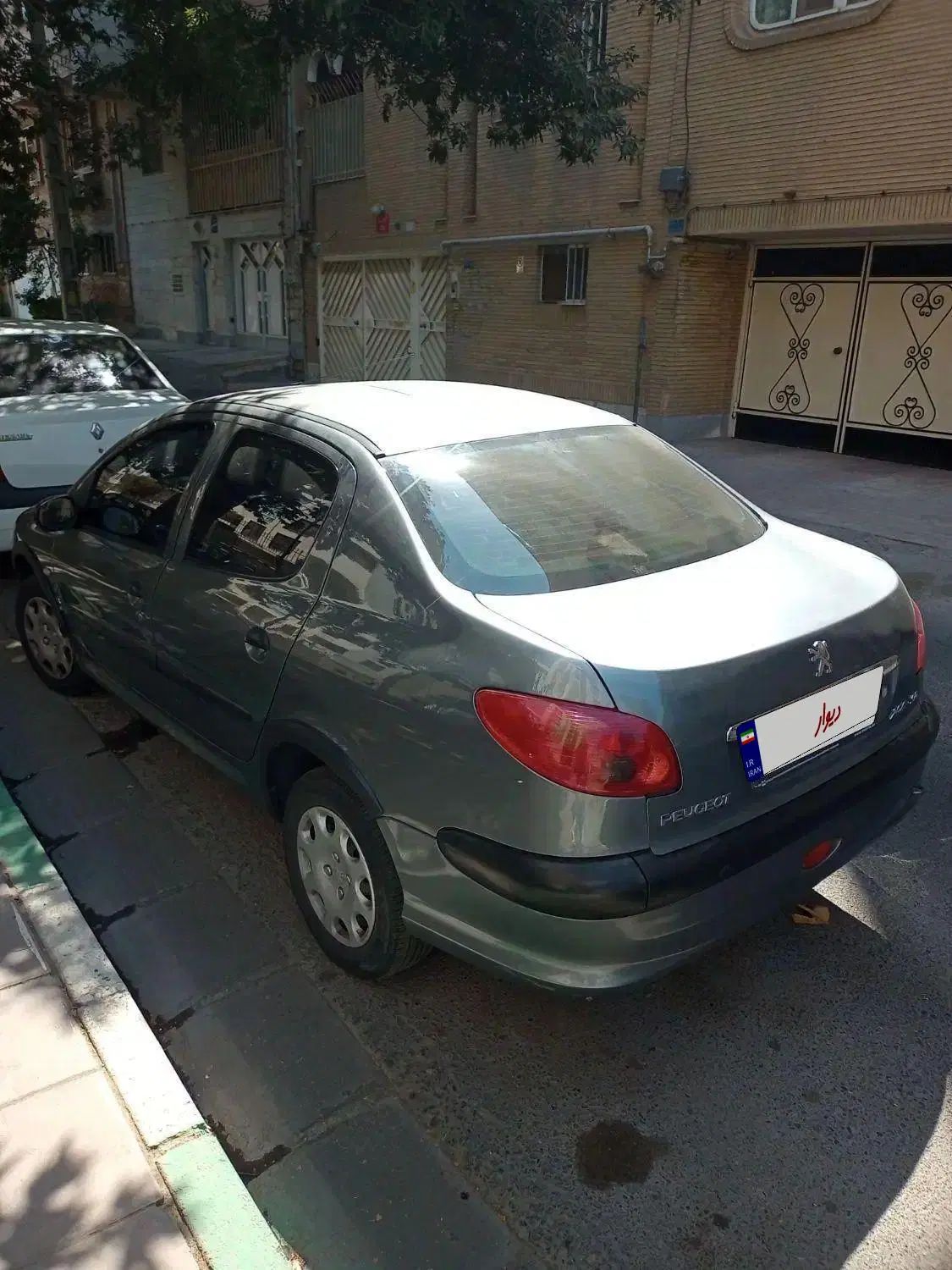 پژو ۲۰۶ صندوق دار v8 - 1396