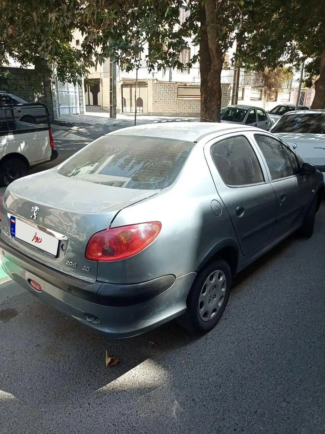 پژو ۲۰۶ صندوق دار v8 - 1396