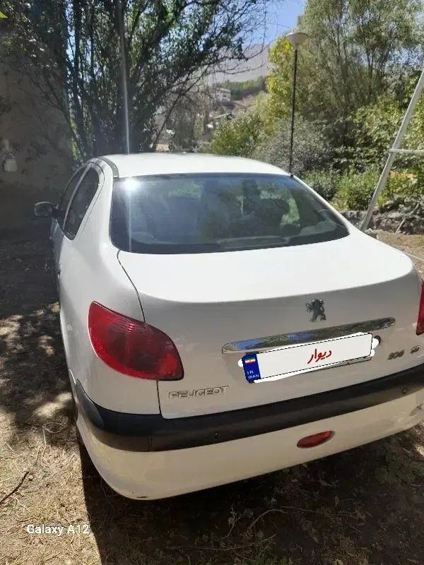 پژو ۲۰۶ صندوق دار v8 - 1393