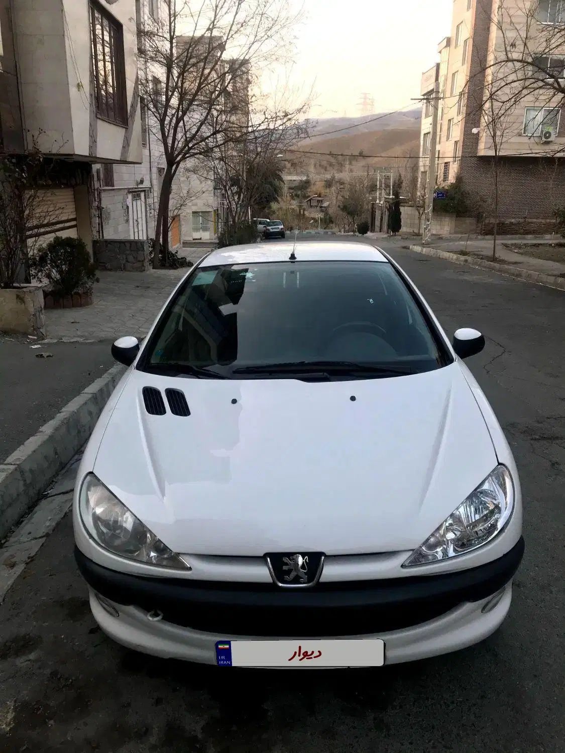 پژو ۲۰۶ صندوق دار v8 - 1397