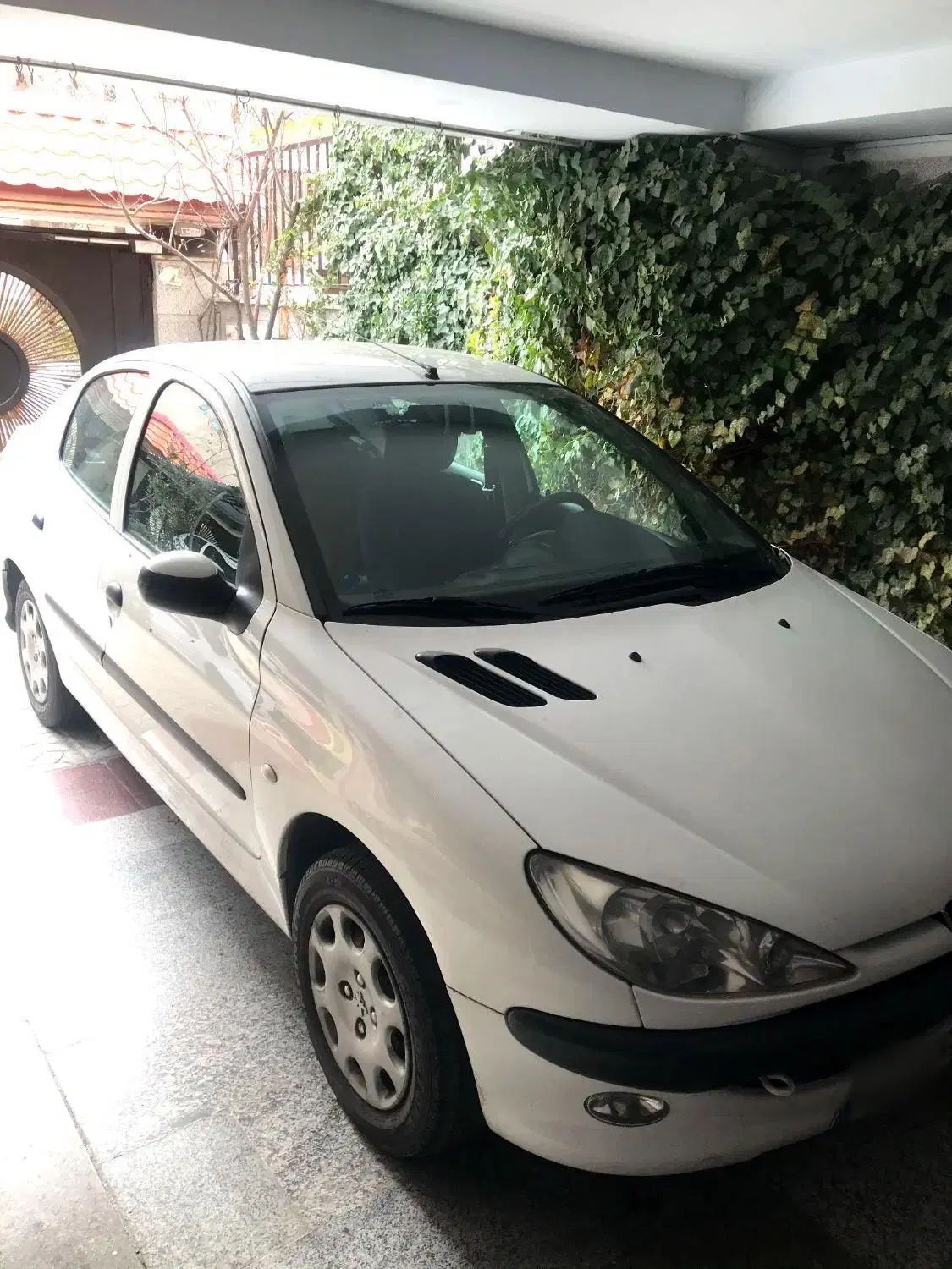 پژو ۲۰۶ صندوق دار v8 - 1397