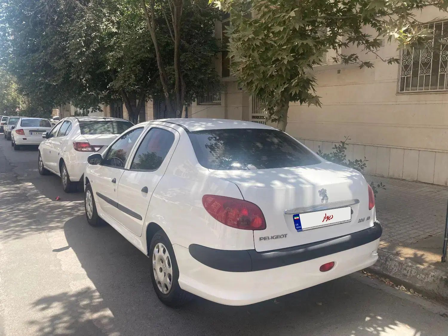 پژو ۲۰۶ صندوق دار v8 - 1396
