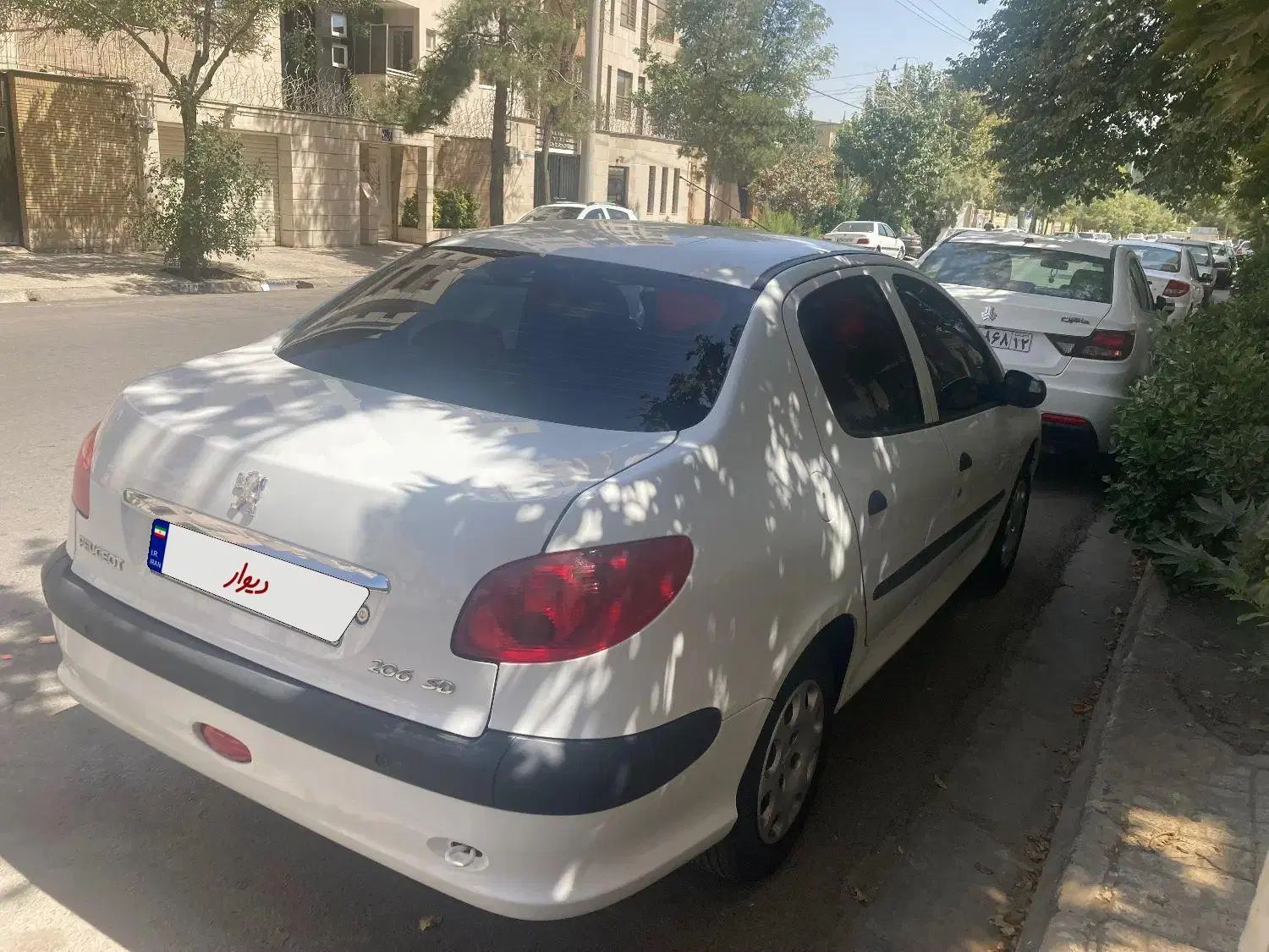 پژو ۲۰۶ صندوق دار v8 - 1396