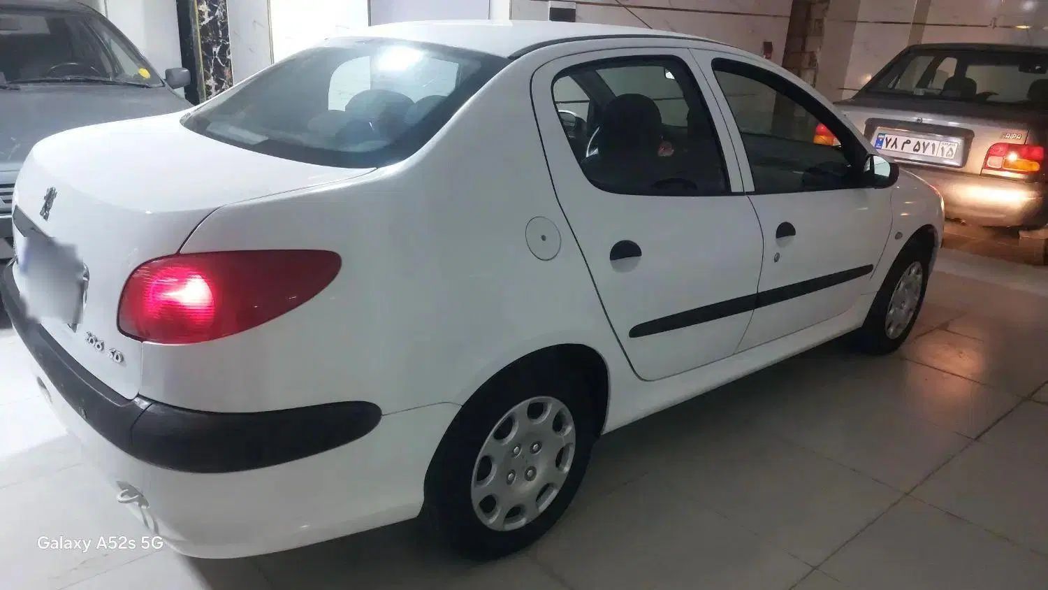 پژو ۲۰۶ صندوق دار v8 - 1396