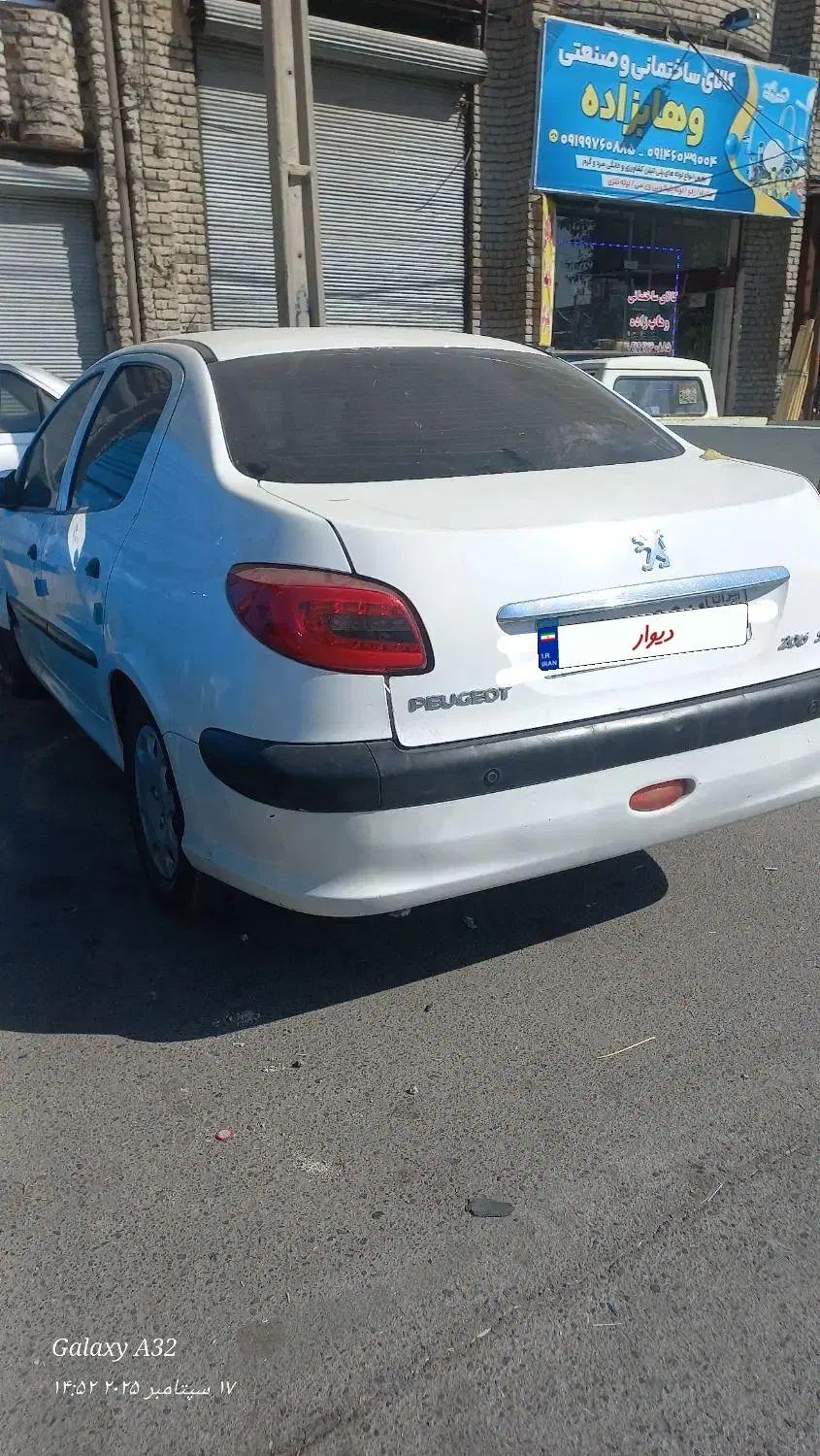 پژو ۲۰۶ صندوق دار v8 - 1394
