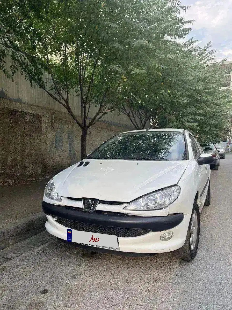 پژو ۲۰۶ صندوق دار v8 - 1396