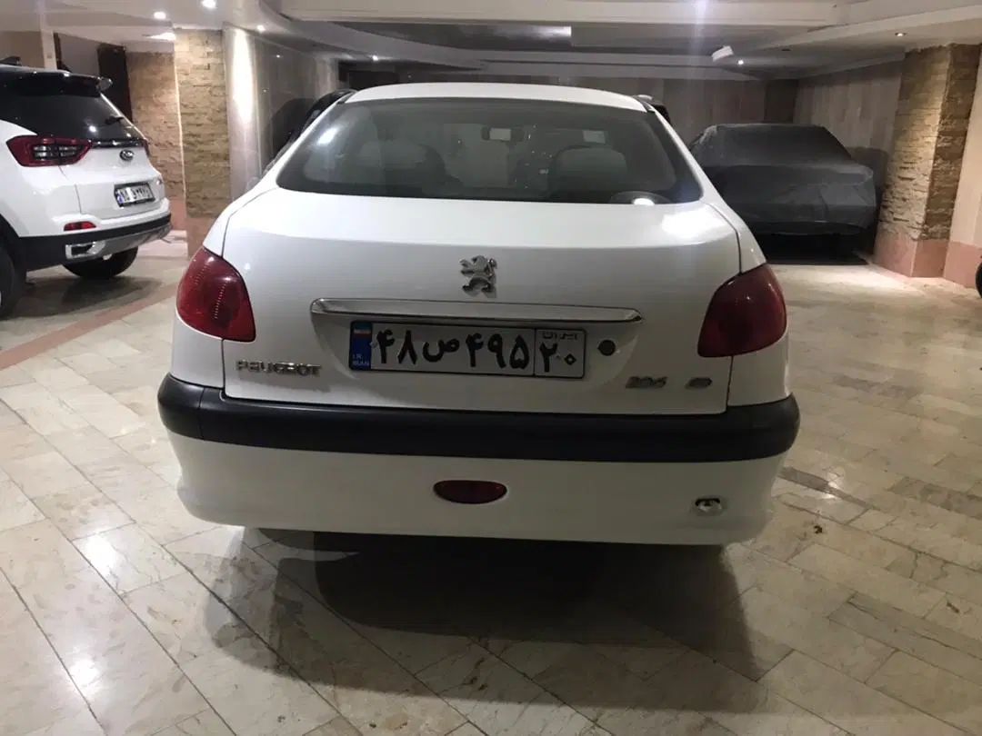 پژو ۲۰۶ صندوق دار v8 - 1394