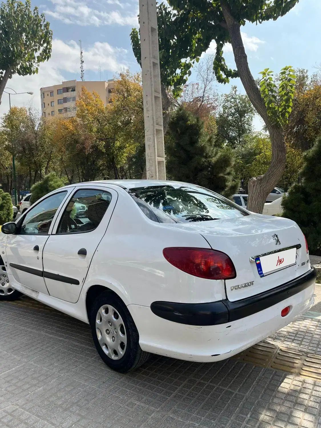 پژو ۲۰۶ صندوق دار v8 - 1398