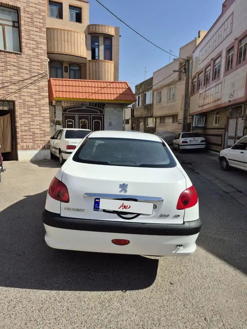 پژو ۲۰۶ صندوق دار v8 - 1396