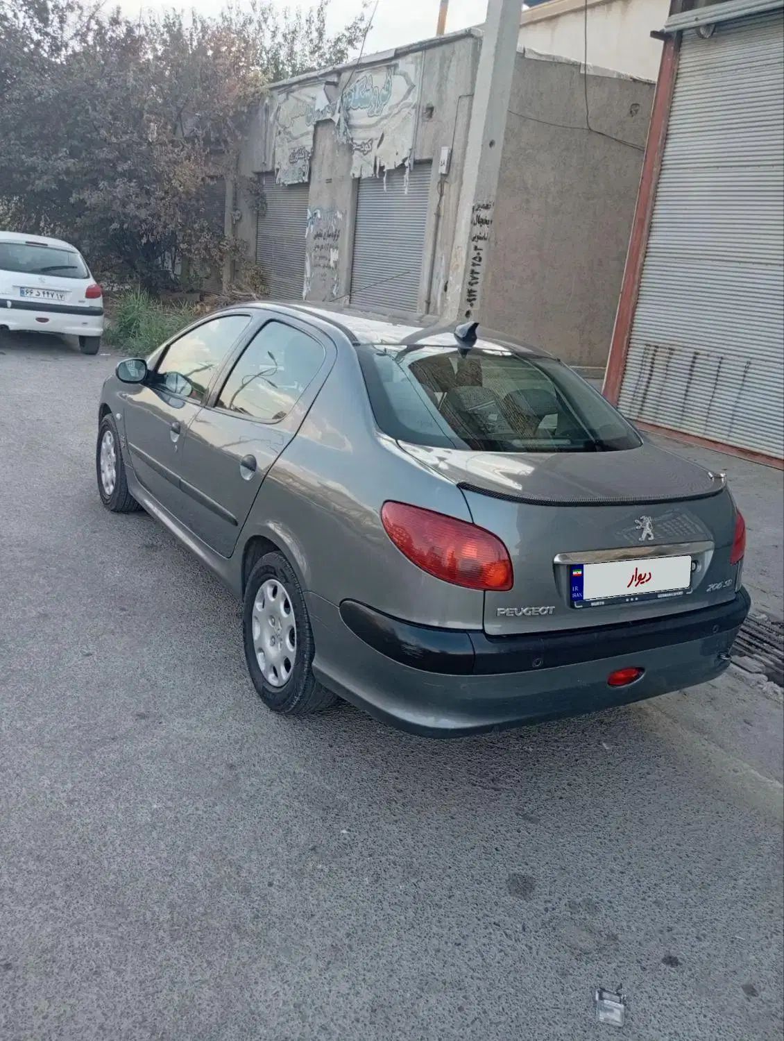 پژو ۲۰۶ صندوق دار v8 - 1395