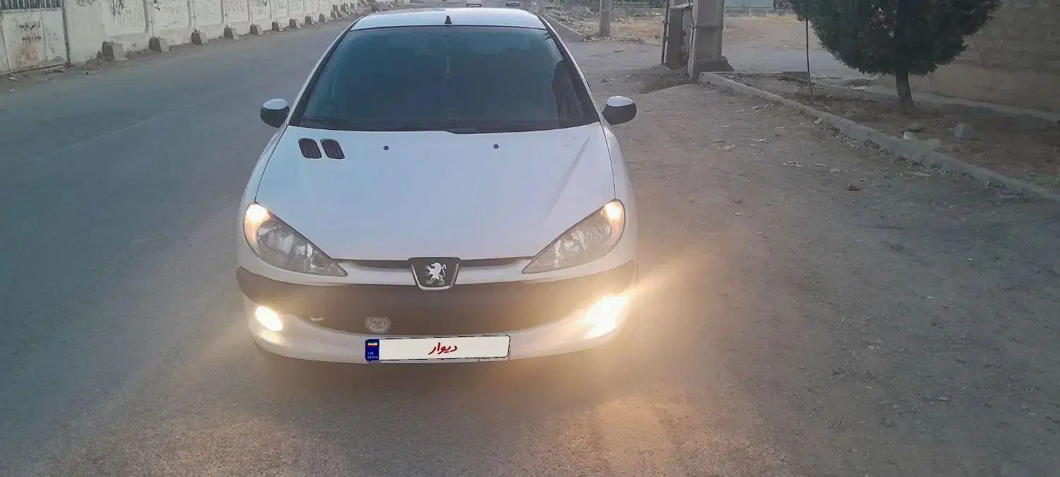 پژو ۲۰۶ صندوق دار v8 - 1395