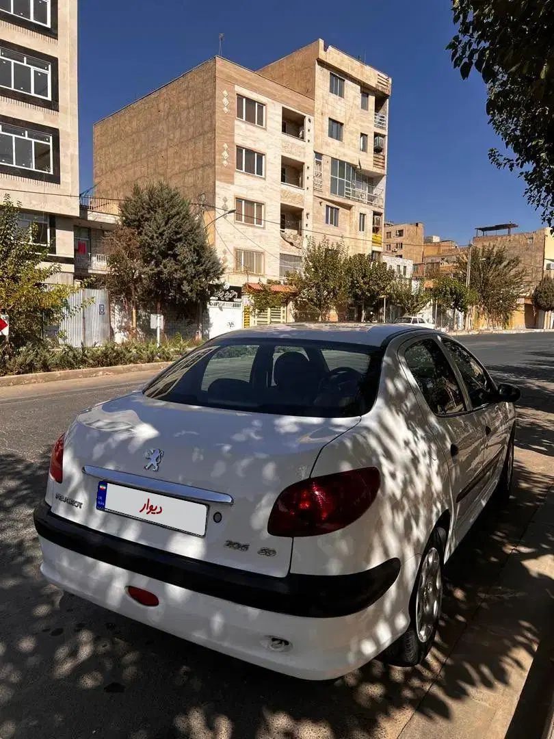پژو ۲۰۶ صندوق دار v8 - 1396