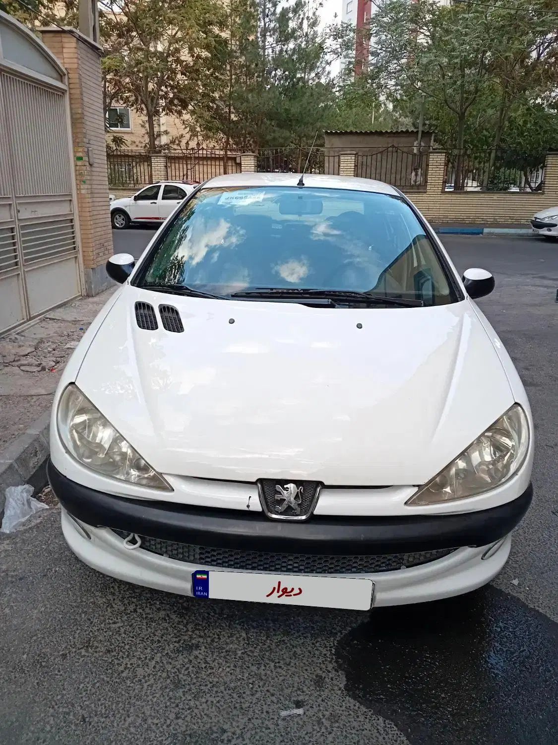 پژو ۲۰۶ صندوق دار v8 - 1394