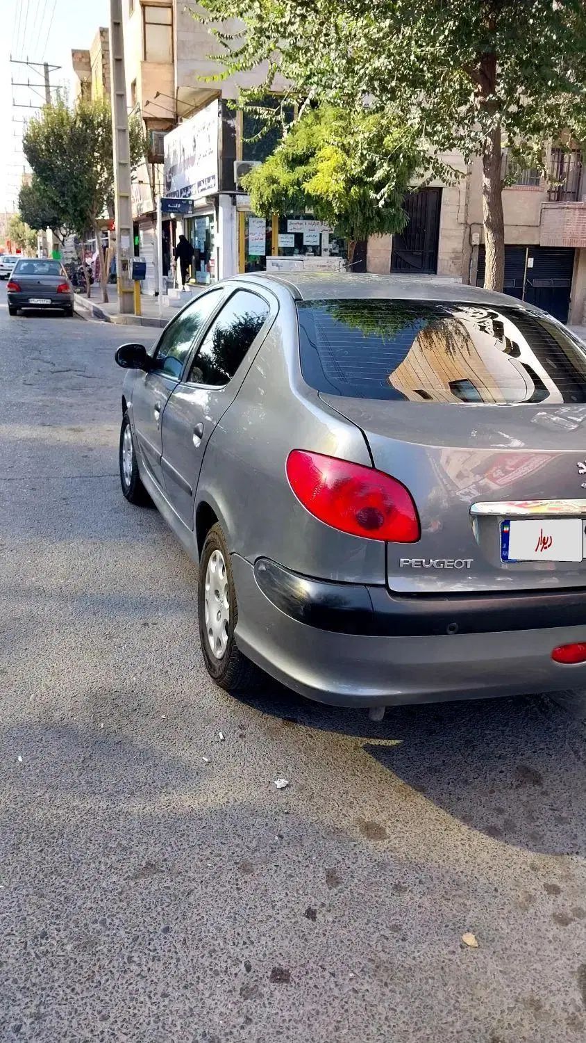 پژو ۲۰۶ صندوق دار v8 - 1396