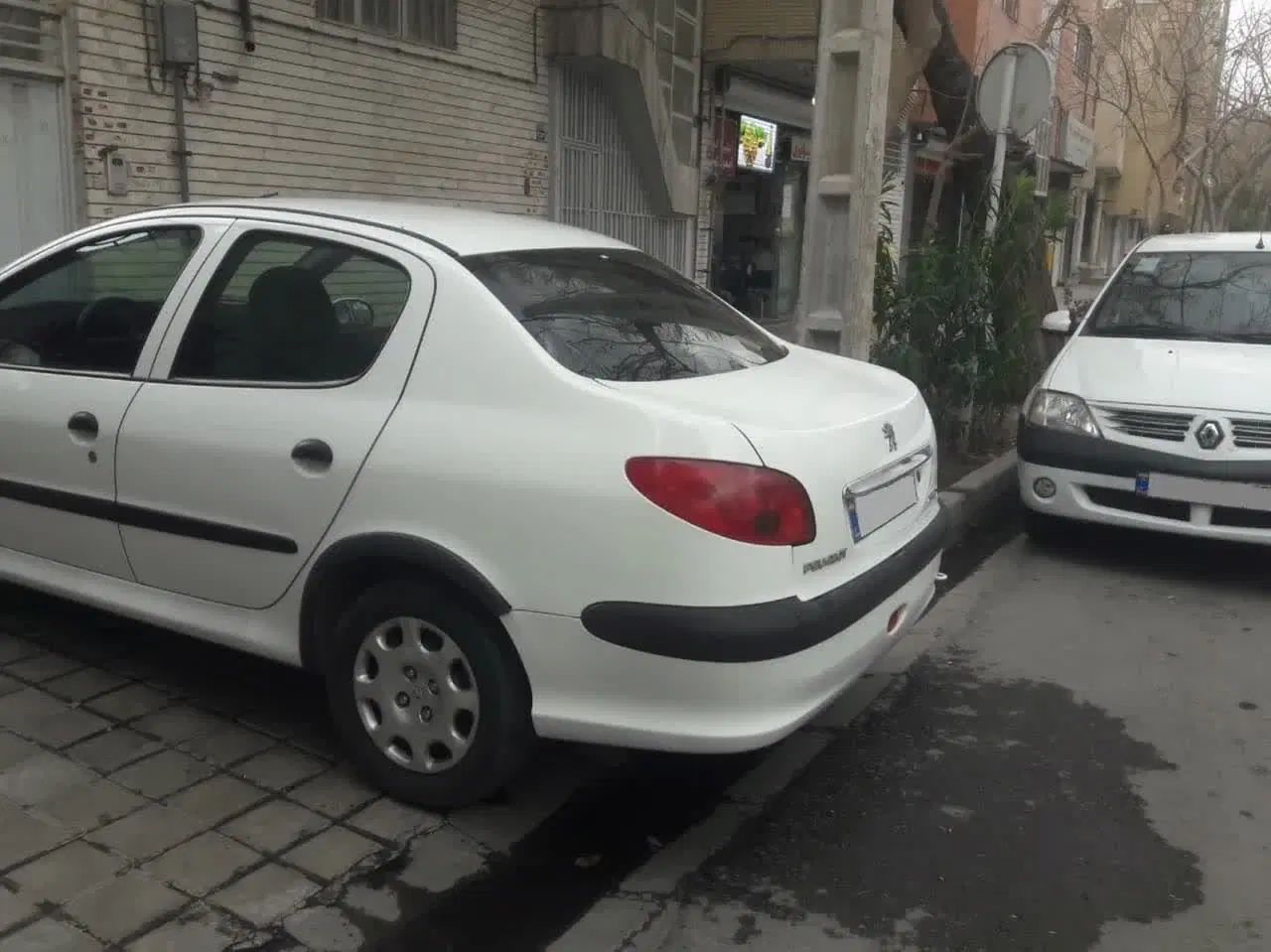 پژو ۲۰۶ صندوق دار v8 - 1396