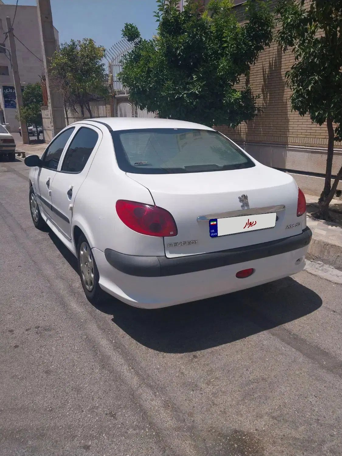پژو ۲۰۶ صندوق دار v8 - 1391