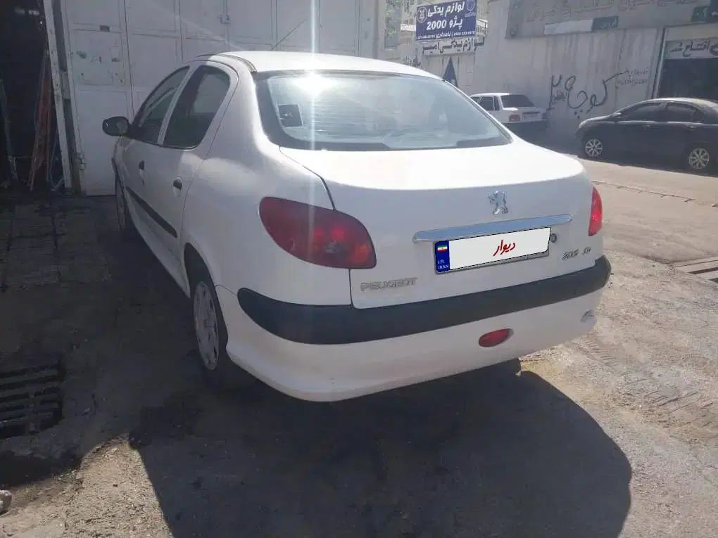 پژو ۲۰۶ صندوق دار v8 - 1394