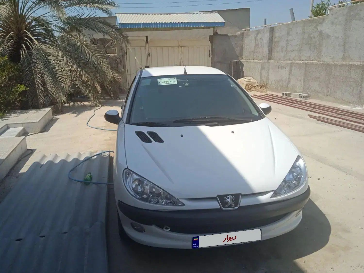 پژو ۲۰۶ صندوق دار v8 - 1399