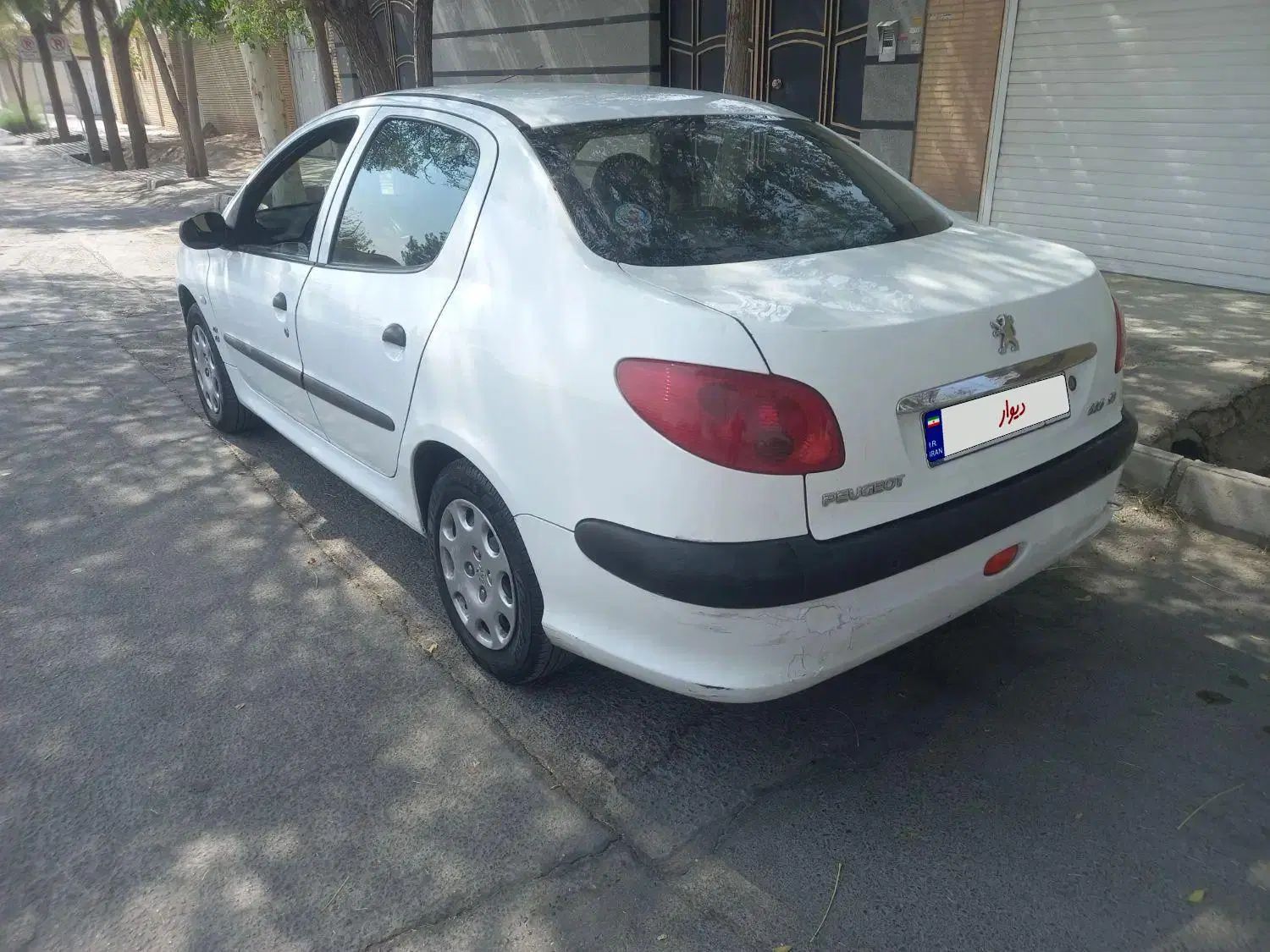 پژو ۲۰۶ صندوق دار v8 - 1396