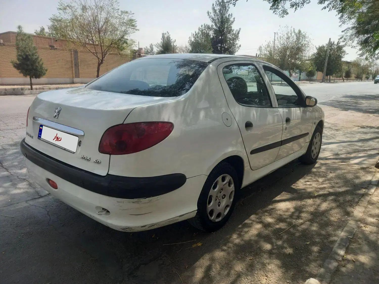 پژو ۲۰۶ صندوق دار v8 - 1396