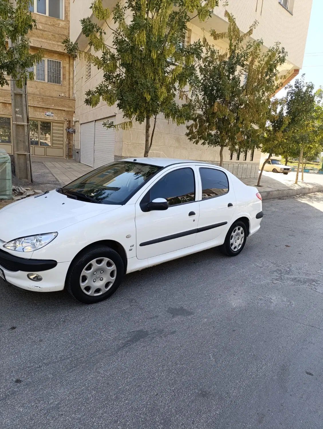 پژو ۲۰۶ صندوق دار v8 - 1396