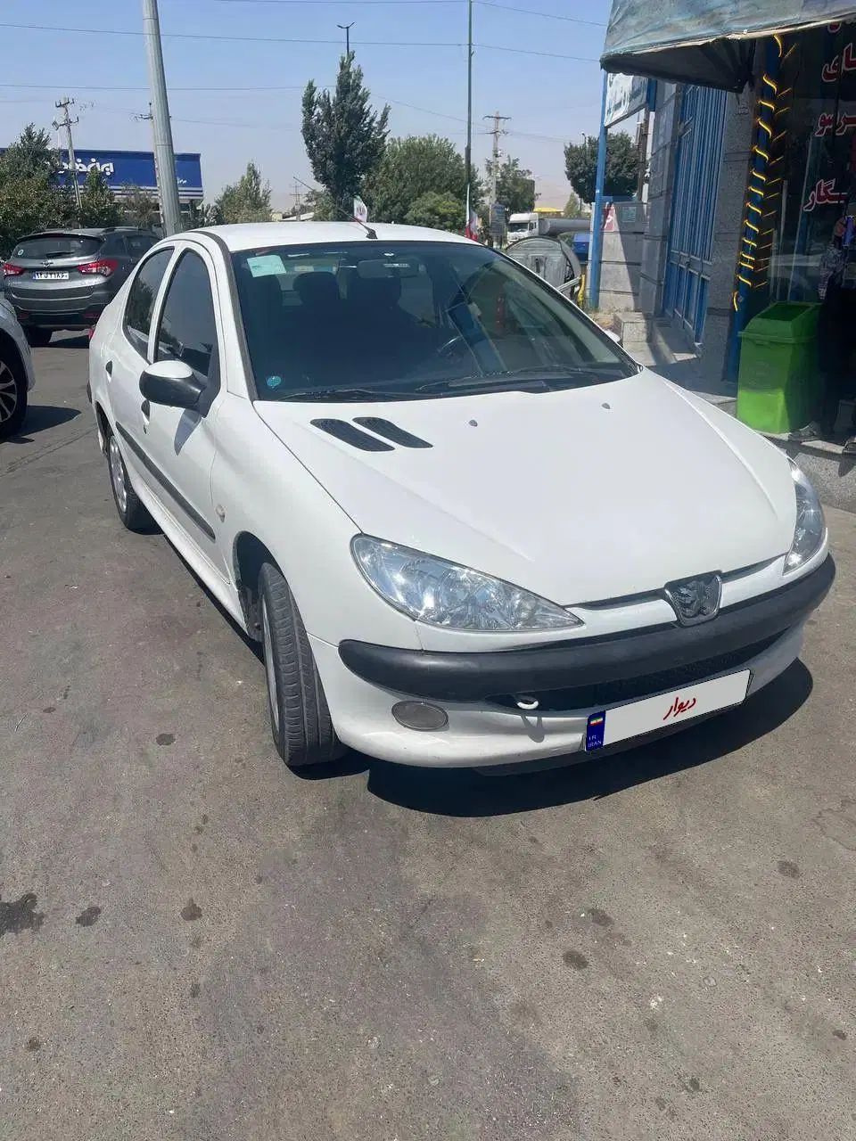 پژو ۲۰۶ صندوق دار v8 - 1396