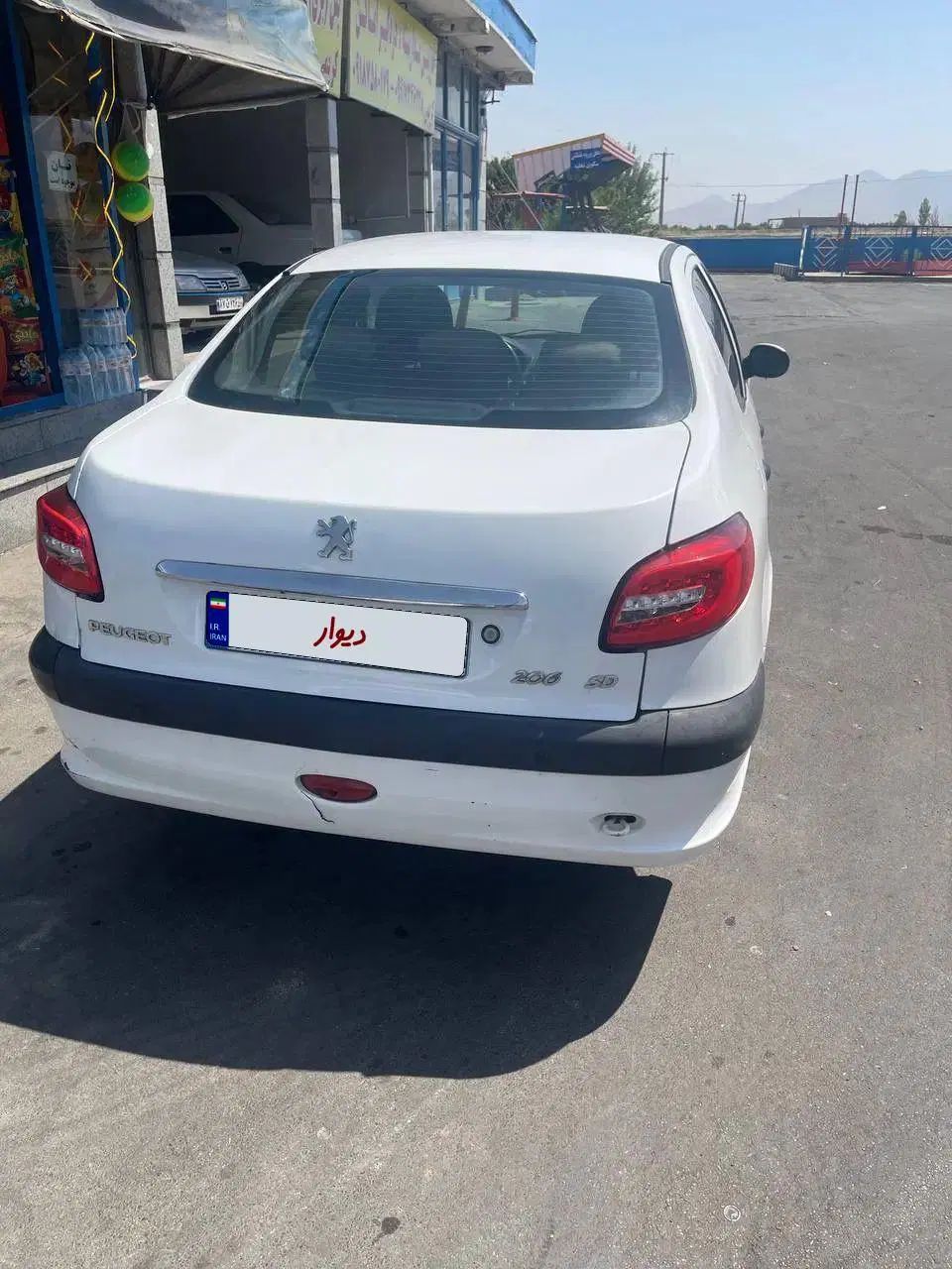 پژو ۲۰۶ صندوق دار v8 - 1396