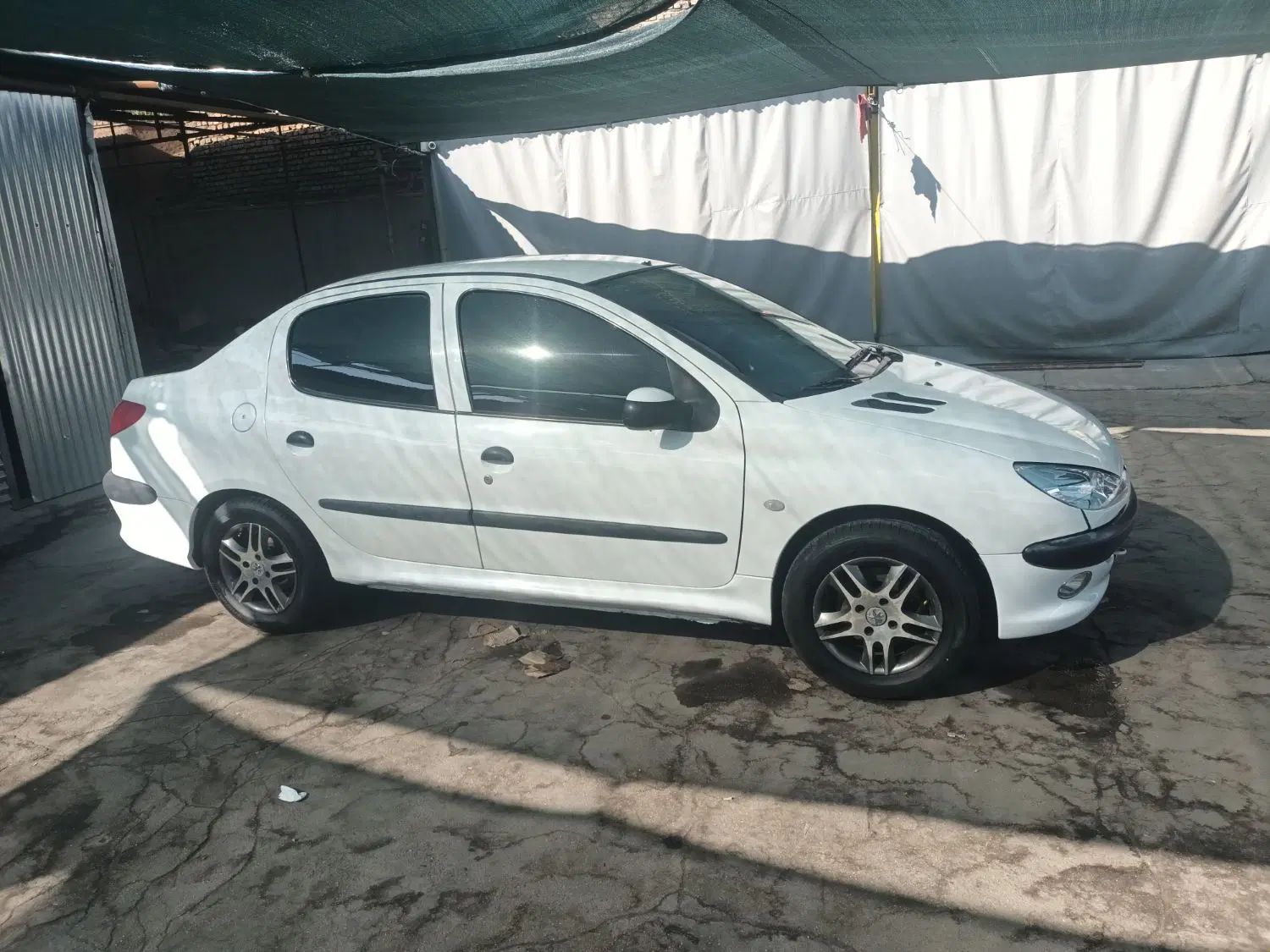 پژو ۲۰۶ صندوق دار v8 - 1396