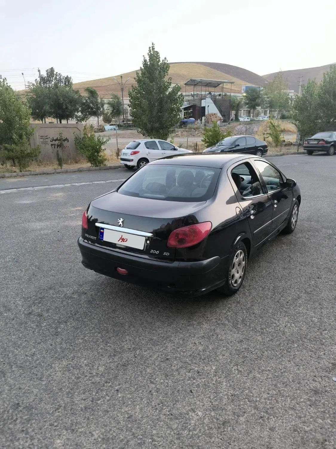 پژو ۲۰۶ صندوق دار v8 - 1394