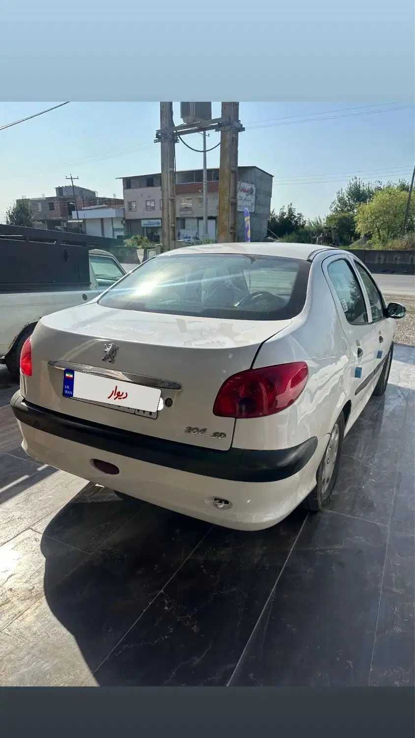 پژو ۲۰۶ صندوق دار v8 - 1394